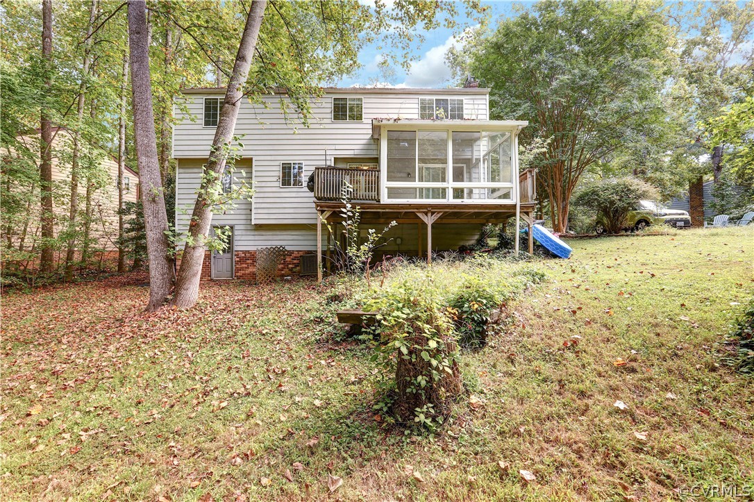 13818 Sutters Mill Road Midlothian, VA 23112 - Photo 5 of 37 front view of a house with a yard
