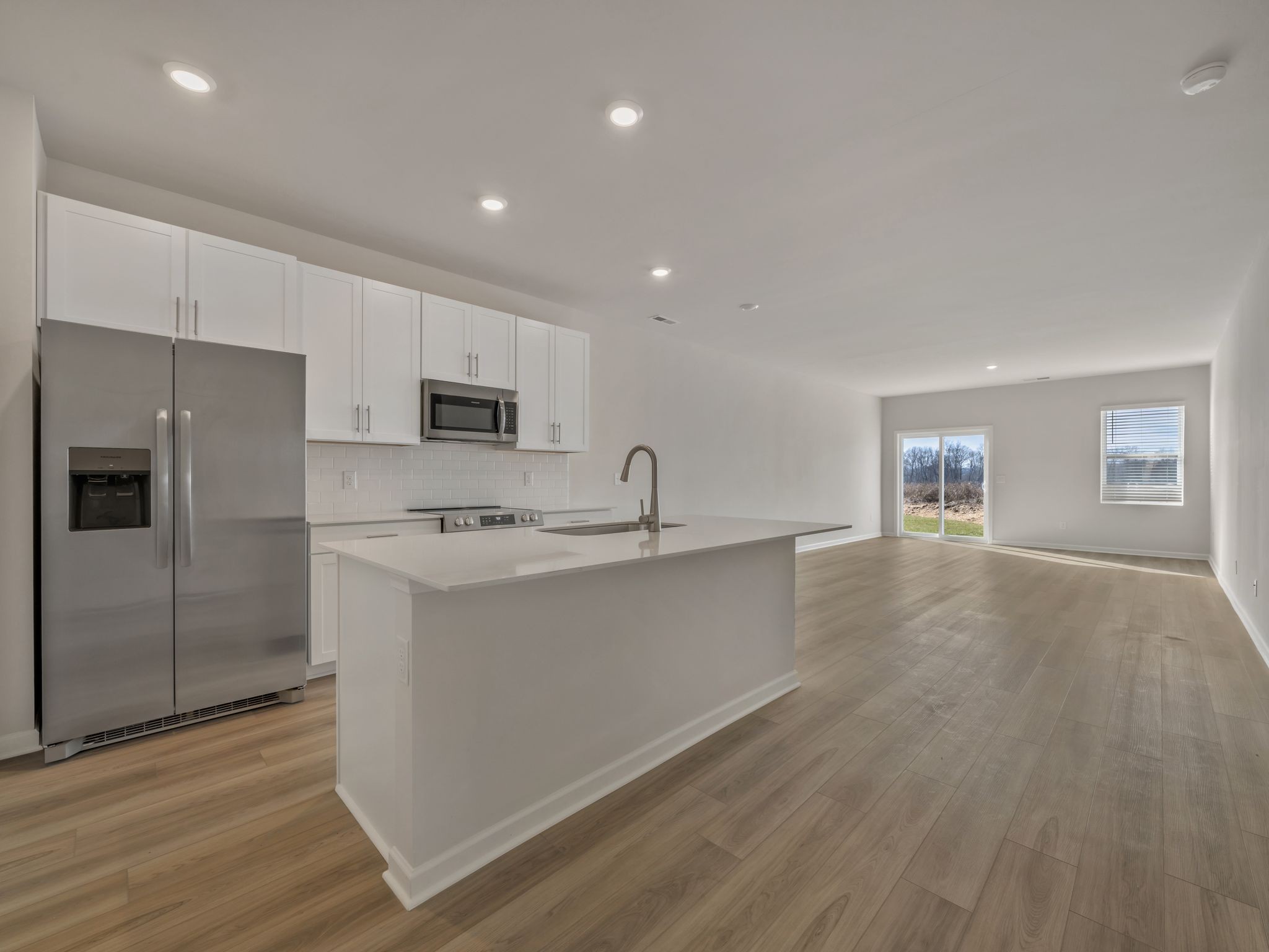 620 Shoemaker Lane Clarksville, TN 37043 - Photo 1 of 13 a kitchen with stainless steel appliances a refrigerator sink and microwave
