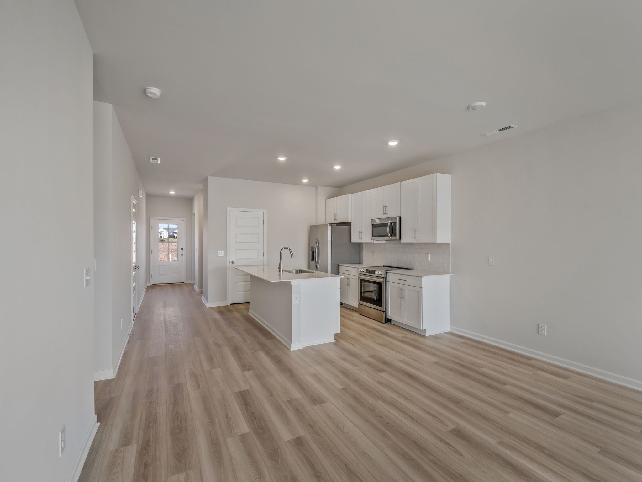 620 Shoemaker Lane Clarksville, TN 37043 - Photo 6 of 13 a view of kitchen with wooden floor