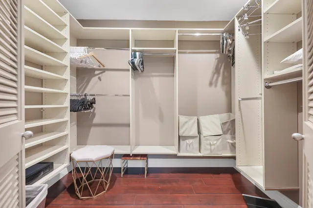 a view of a patio with table and chairs and potted plants