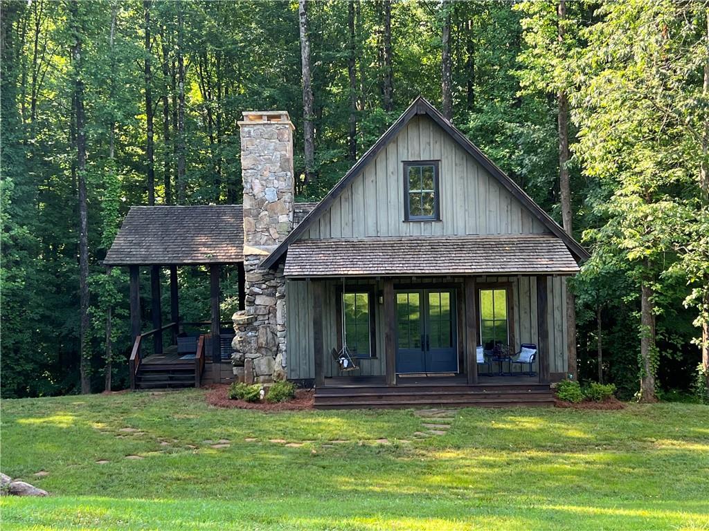 8765 Waldrip Road Gainesville, GA 30506 - Photo 1 of 1 a view of a house with pool table and chairs