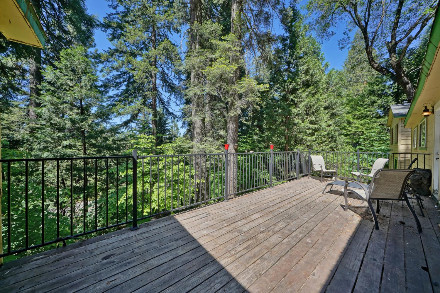 6929 Split Bend Road Pollock Pines, CA 95726 - Photo 33 of 38 a view of balcony with wooden floor and outdoor seating