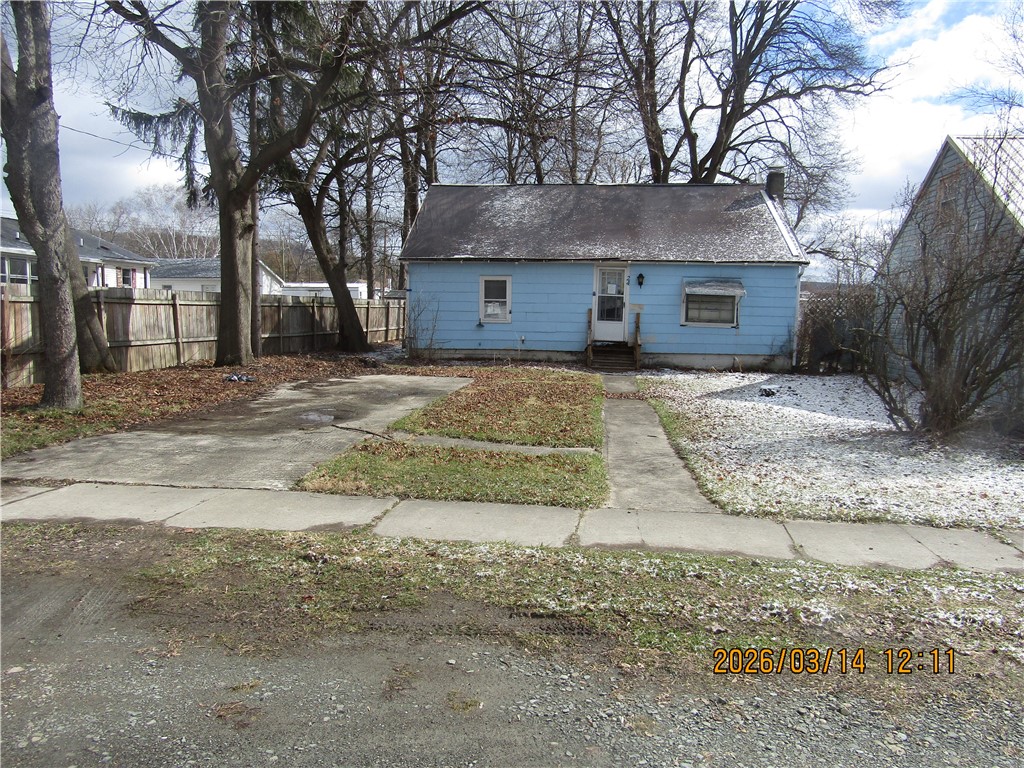 24 Stanton Street Painted Post, NY 14870 - Photo 2 of 18 Front yard with concrete Driveway