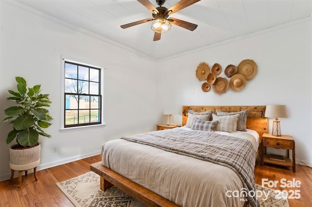 956 Stoney Point Road Kings Mountain, NC 28086 - Photo 13 of 48 a bedroom with a bed and a couch