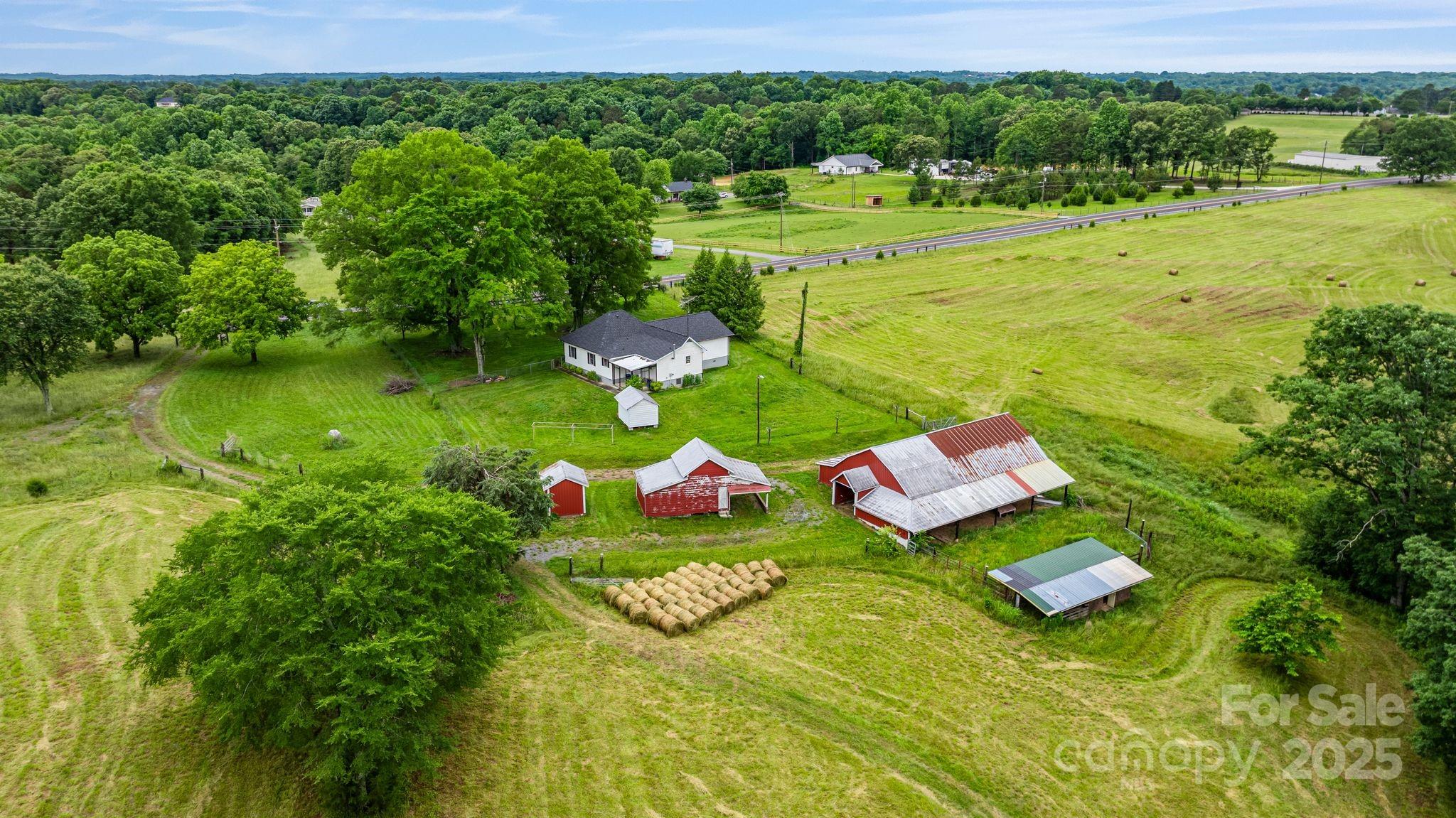 956 Stoney Point Road Kings Mountain, NC 28086 - Photo 2 of 48 a view of a golf course with chairs