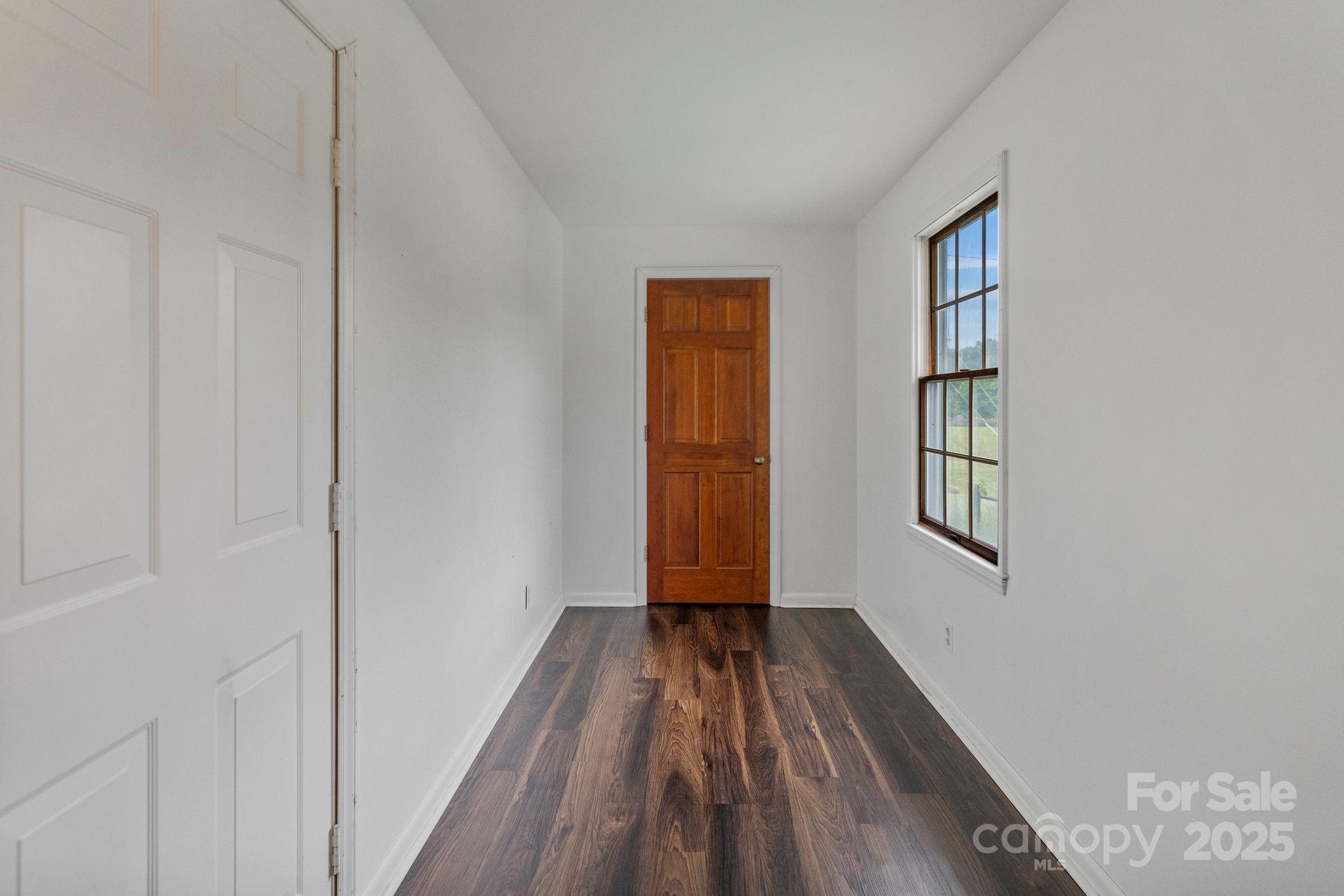 956 Stoney Point Road Kings Mountain, NC 28086 - Photo 24 of 48 a view of room with window and wooden floor