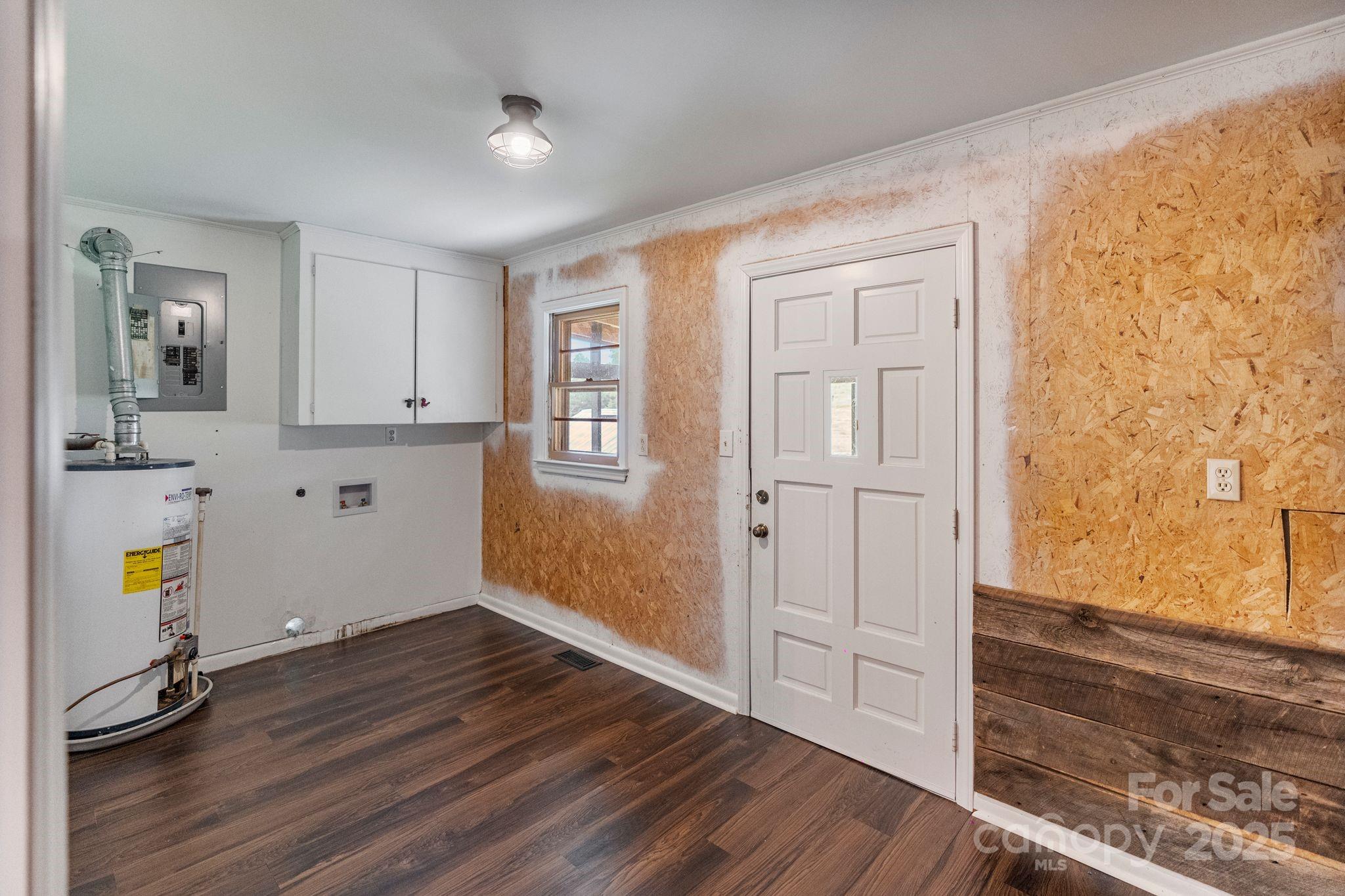 956 Stoney Point Road Kings Mountain, NC 28086 - Photo 27 of 48 wooden floor in an empty room and a window