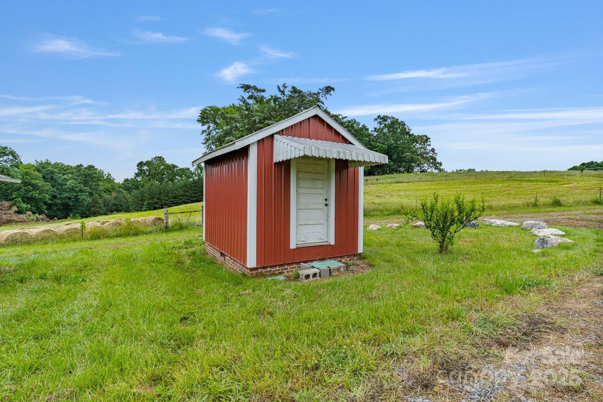 956 Stoney Point Road Kings Mountain, NC 28086 - Photo 35 of 48 a view of a house with a yard and a large tree