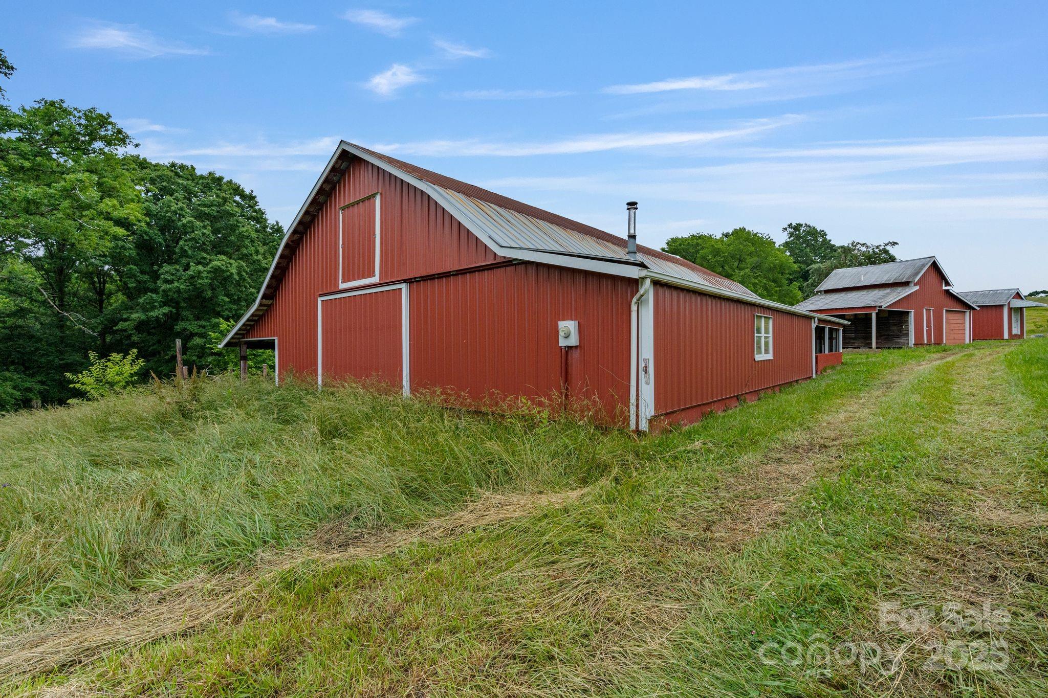 956 Stoney Point Road Kings Mountain, NC 28086 - Photo 37 of 48 a view of a backyard with plants and a garden