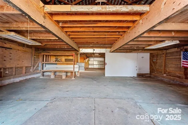 a view of a room with wooden walls