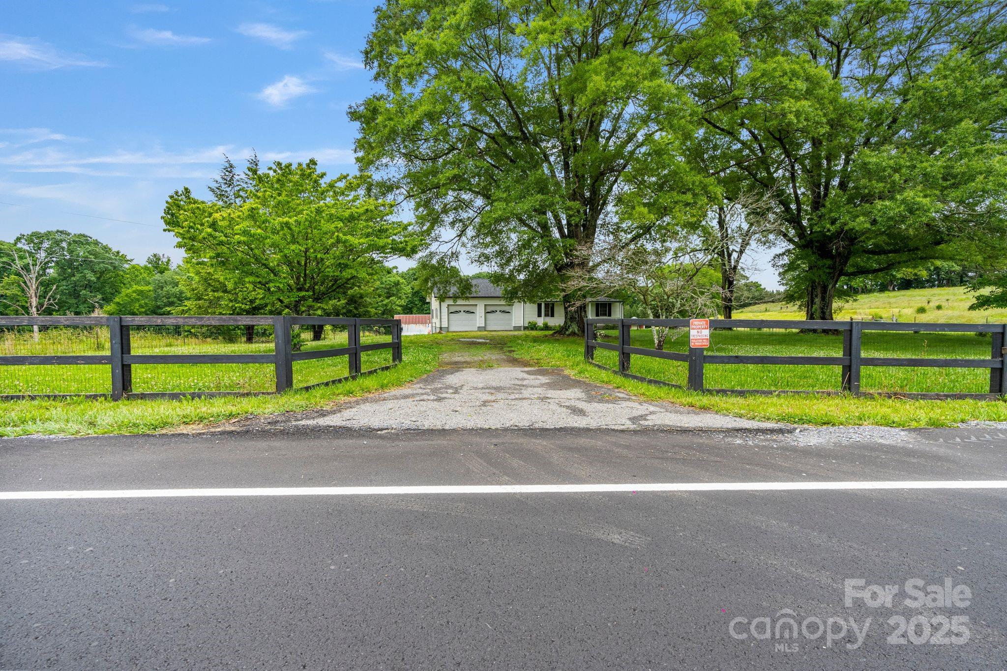 956 Stoney Point Road Kings Mountain, NC 28086 - Photo 4 of 48 a view of road with grass and a trees