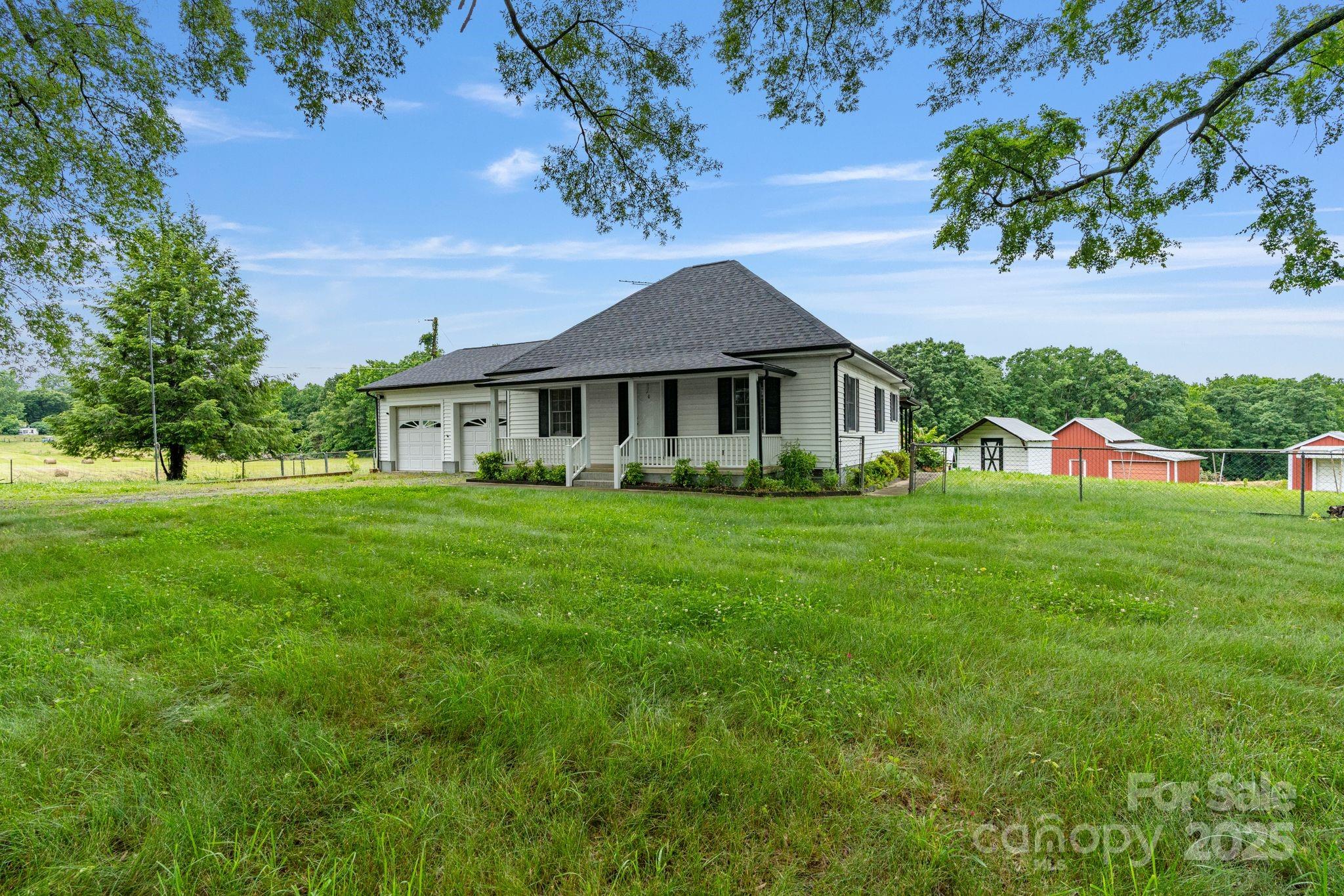 956 Stoney Point Road Kings Mountain, NC 28086 - Photo 48 of 48 a front view of a house with garden