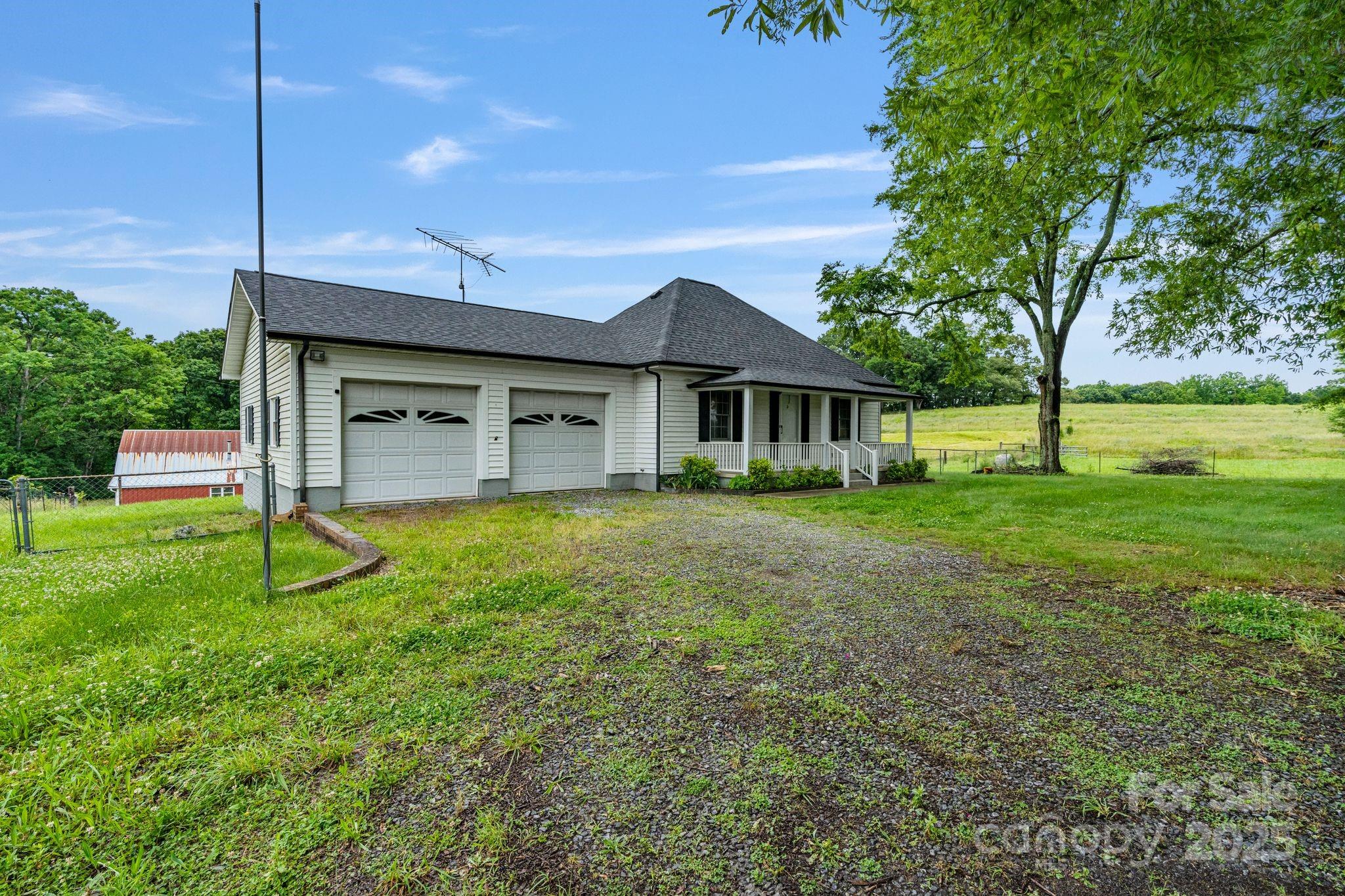 956 Stoney Point Road Kings Mountain, NC 28086 - Photo 5 of 48 a house view with a garden space