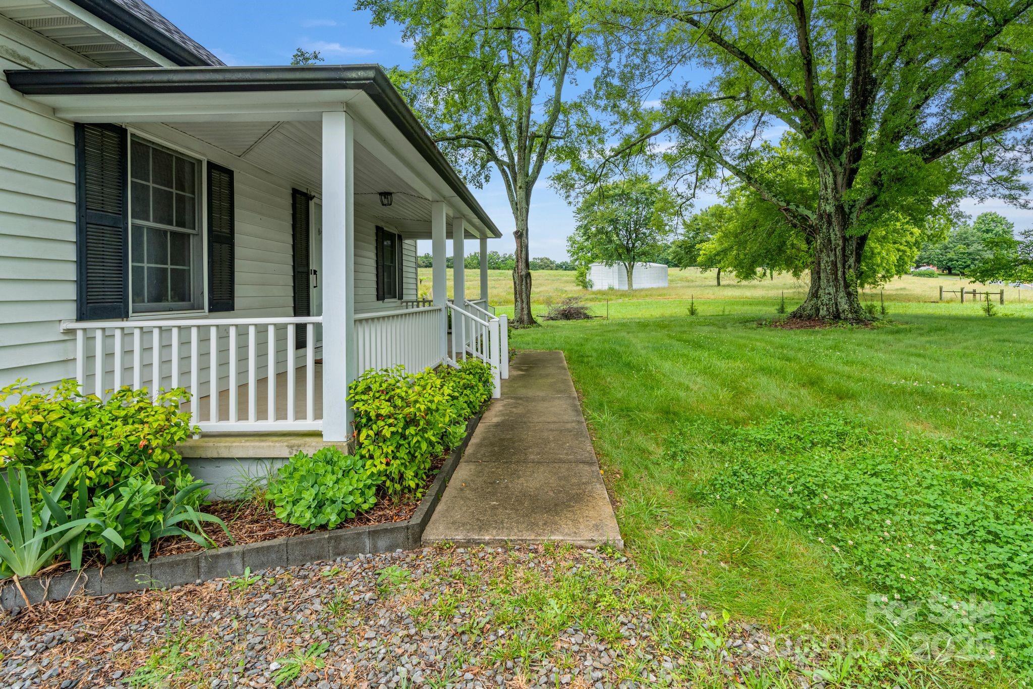 956 Stoney Point Road Kings Mountain, NC 28086 - Photo 6 of 48 a view of a house with a yard