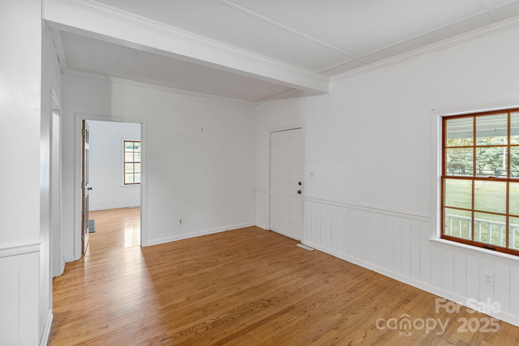 956 Stoney Point Road Kings Mountain, NC 28086 - Photo 9 of 48 wooden floor in an empty room with a window