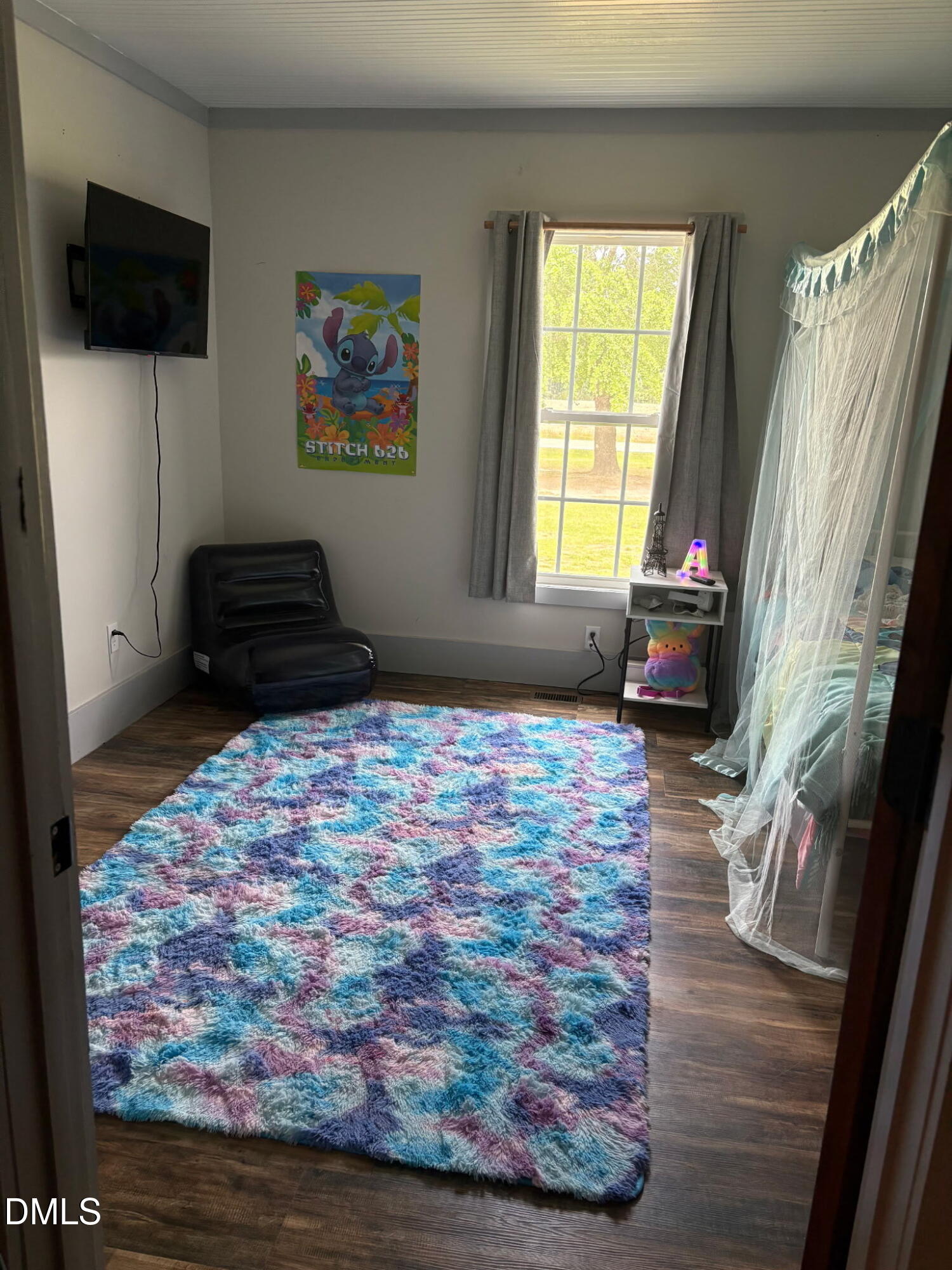 130 Fitzgerald Road Selma, NC 27576 - Photo 18 of 18 a bedroom with a bed and a couch