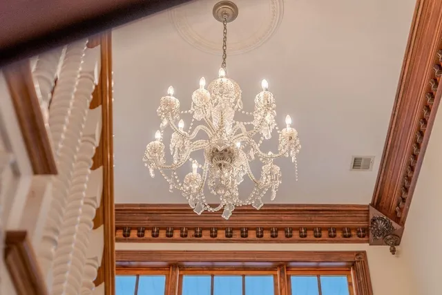 a view of a fireplace with wooden floor