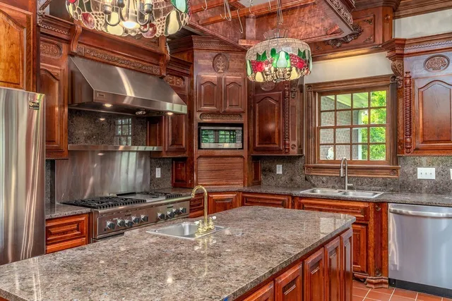 a bathroom with a sink a mirror and a shower