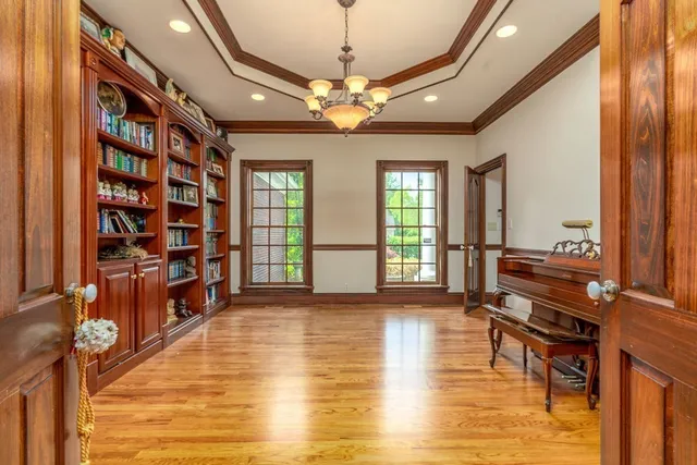 a kitchen that has a sink and a stove in it