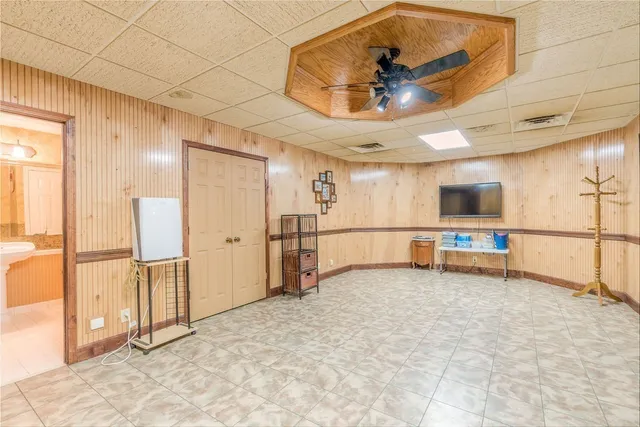 a view of a lake with couches and city view