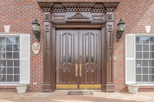 a view of a chandelier in hallway