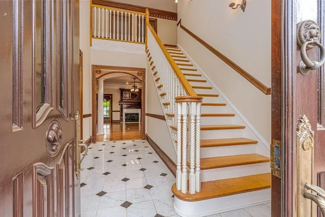 a view of a hall with wooden floor