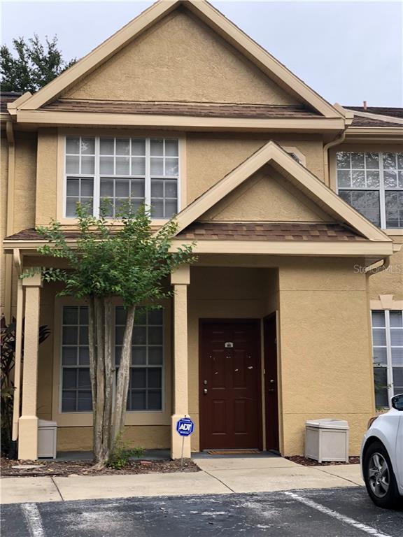 854 Grand Regency Pointe, Unit 101 Altamonte Springs, FL 32714 - Photo 1 of 1 a view of a car garage of the house