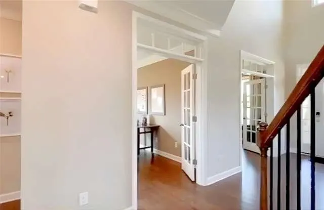 a view of a livingroom from a hallway