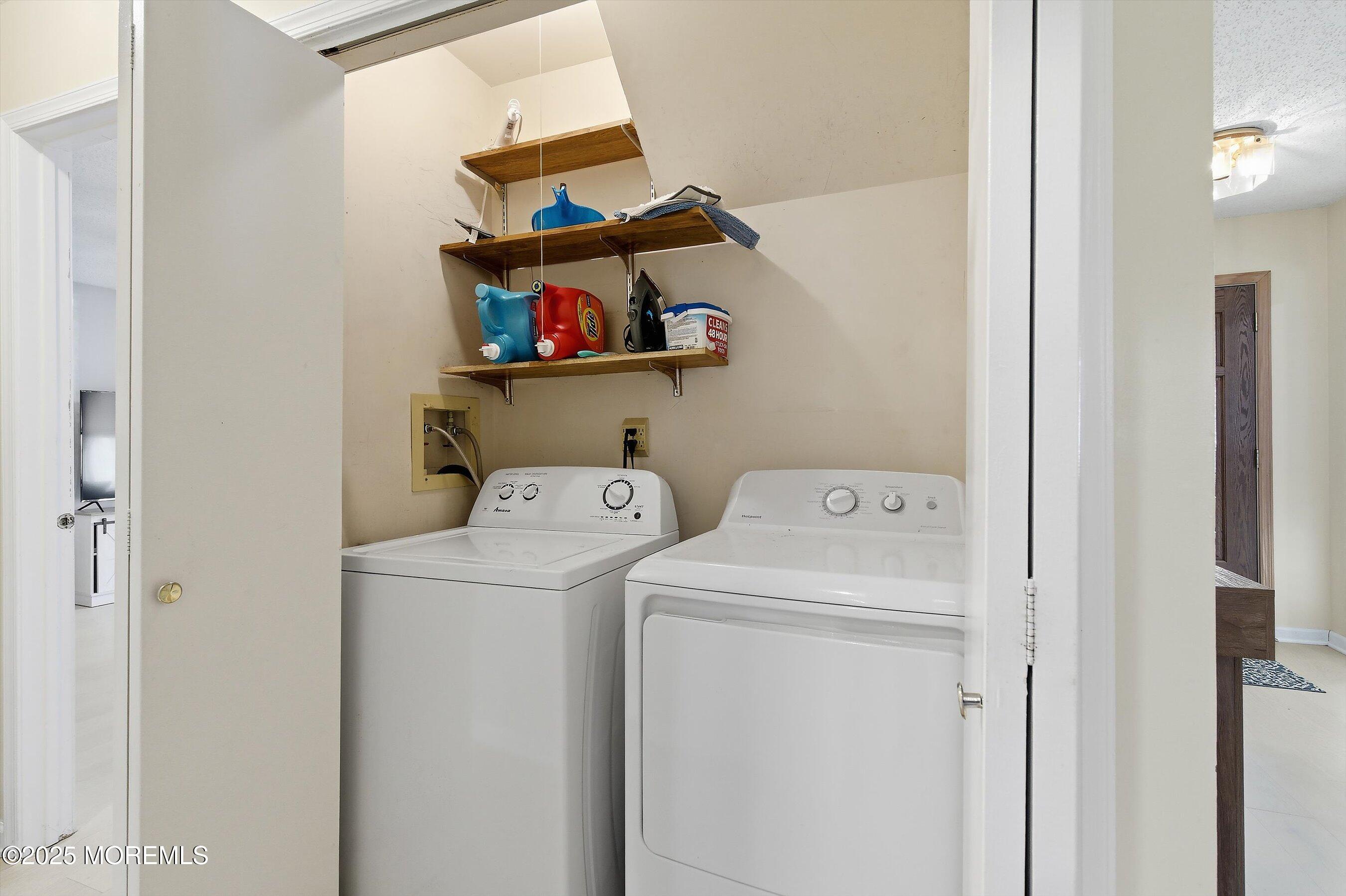 101 Reflection Road Toms River, NJ 08753 - Photo 16 of 28 a utility room with dryer and washer
