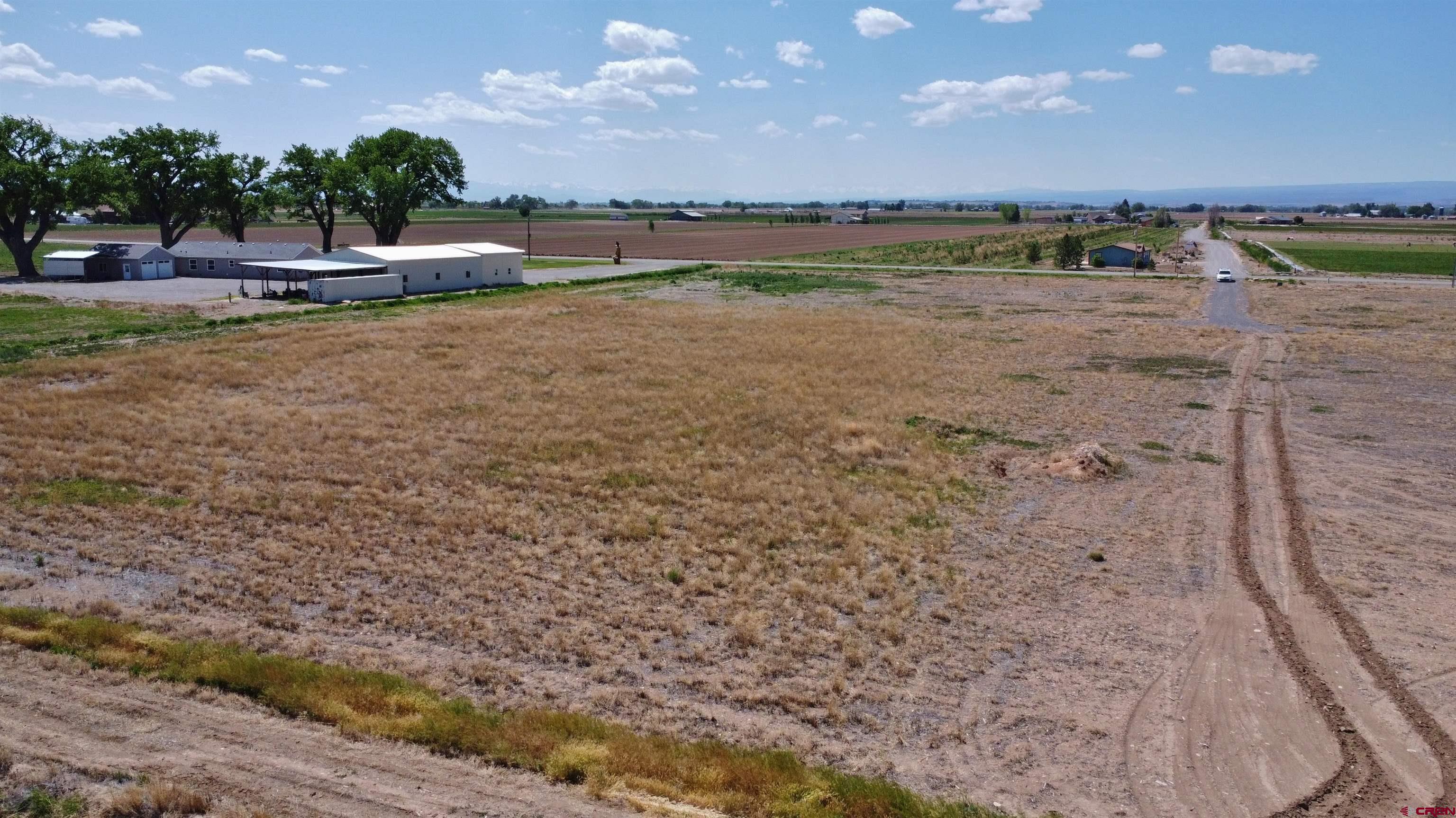 17185 B Road Delta, CO 81416 - Photo 5 of 9 a view of a lake with beach and outdoor space