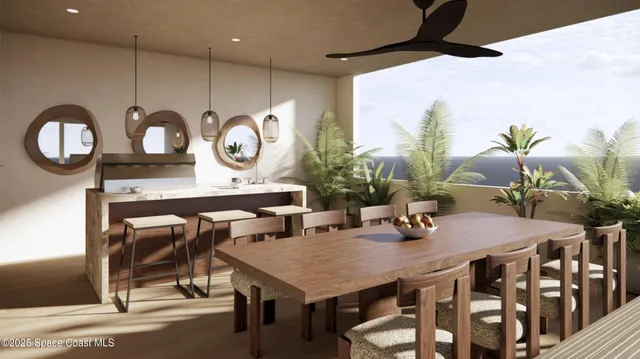 a view of a dining room with furniture and a chandelier