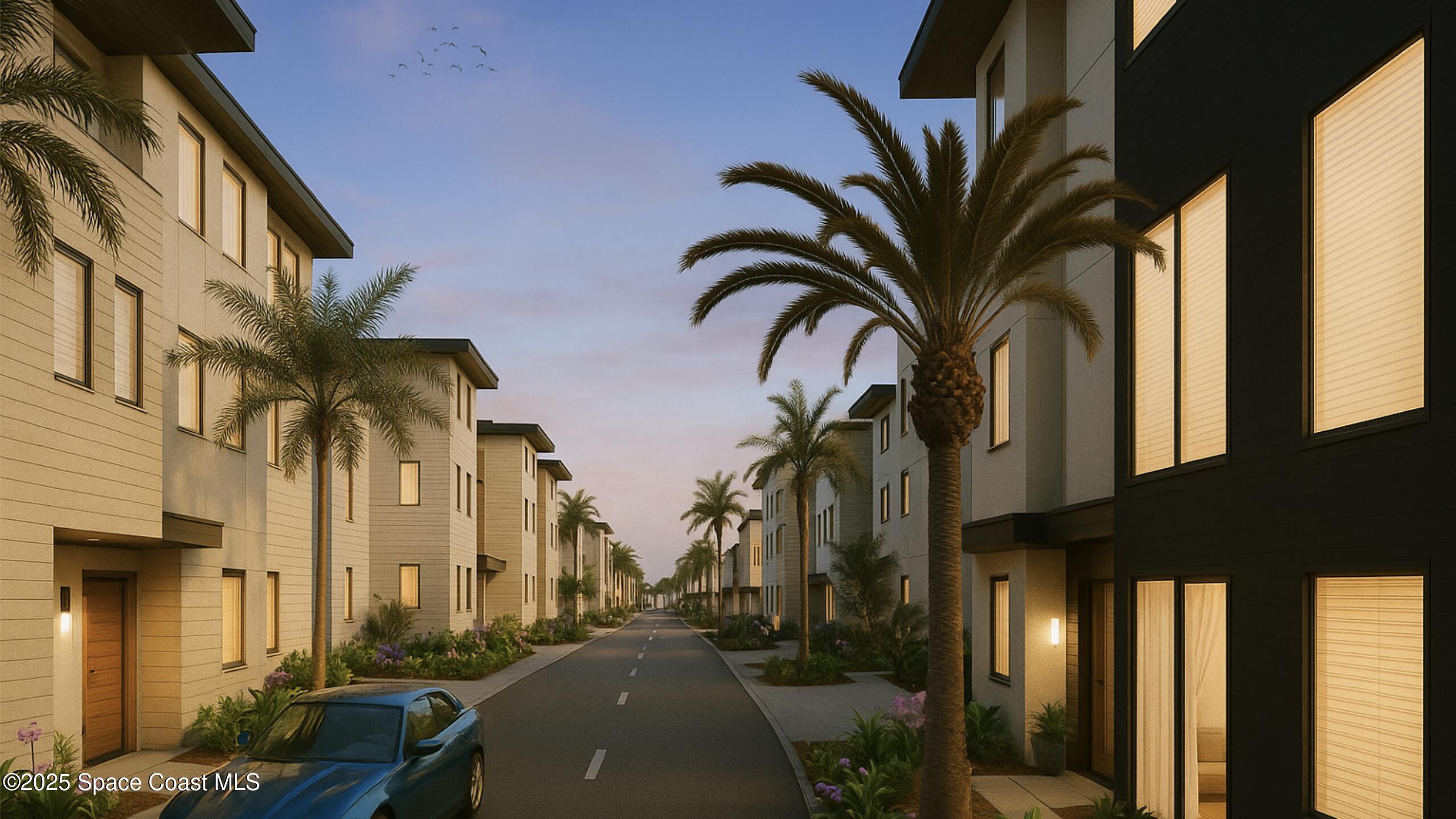 2282 Livnats Lane Melbourne, FL 32901 - Photo 2 of 20 a view of a brick house with a large windows and flower plants