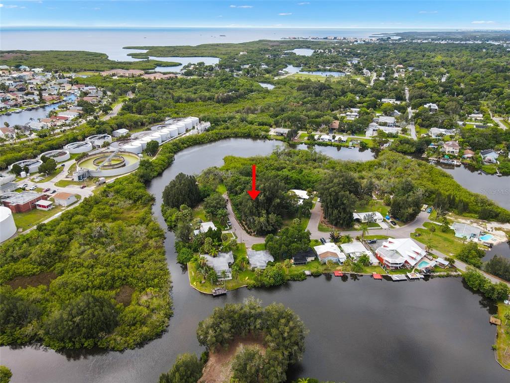 4827 Treasure Drive New Port Richey, FL 34652 - Photo 1 of 1 an aerial view of residential house with outdoor space
