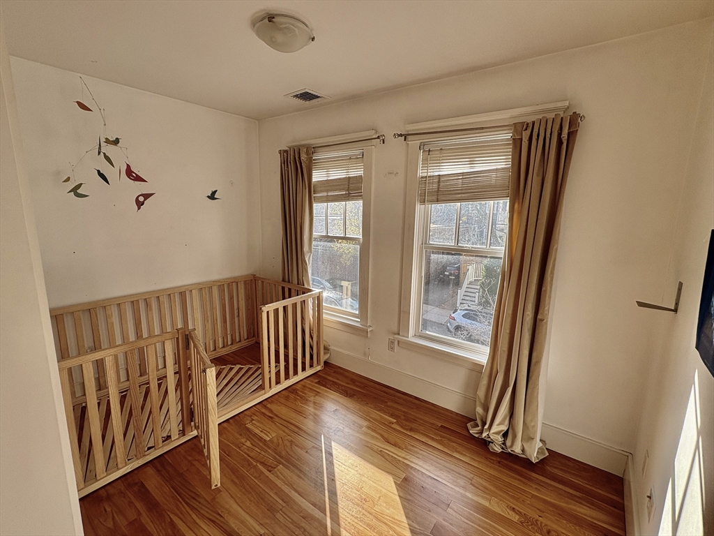 7 Standish Street, Unit 7 Cambridge, MA 02138 - Photo 12 of 16 a view of entryway with wooden floor