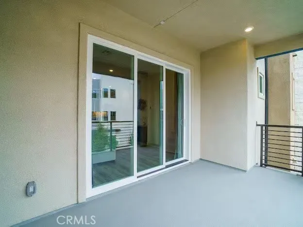 a view of a house with a yard porch and sitting area