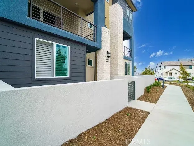 a view of a balcony with chairs