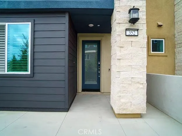 a bathroom with a double vanity sink and a shower