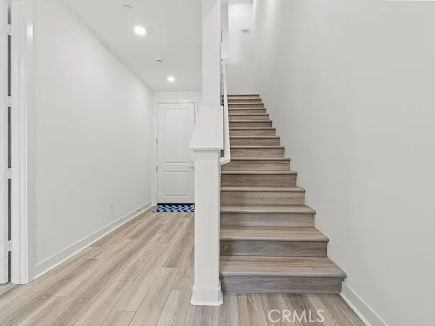 a bathroom with a shower and a glass door