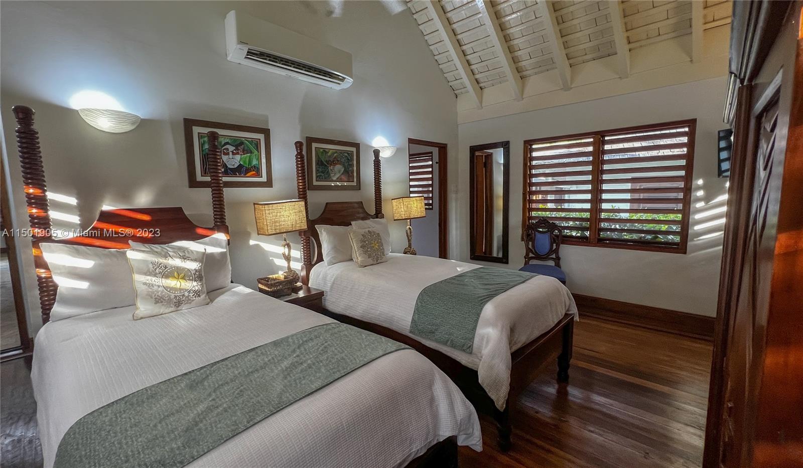0 Country Club Drive undefined, FL 00000 - Photo 43 of 76 a bedroom with two beds and wooden floor