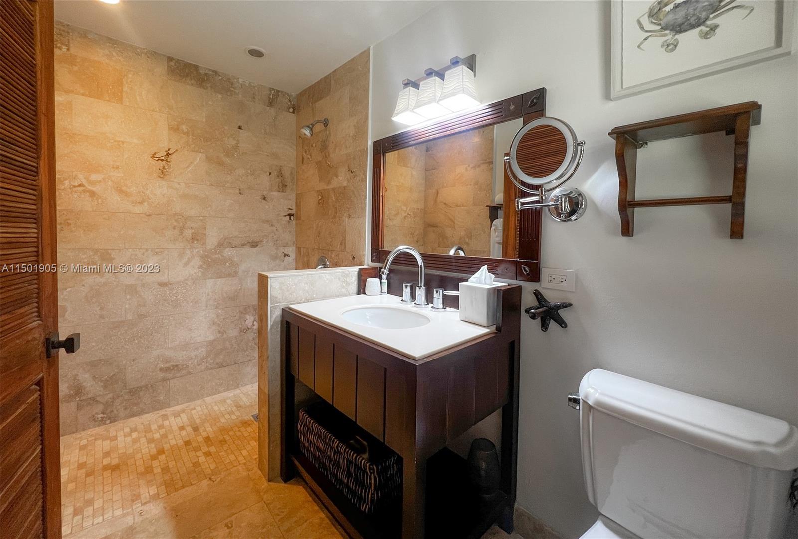 0 Country Club Drive undefined, FL 00000 - Photo 45 of 76 a bathroom with a sink a toilet and a mirror