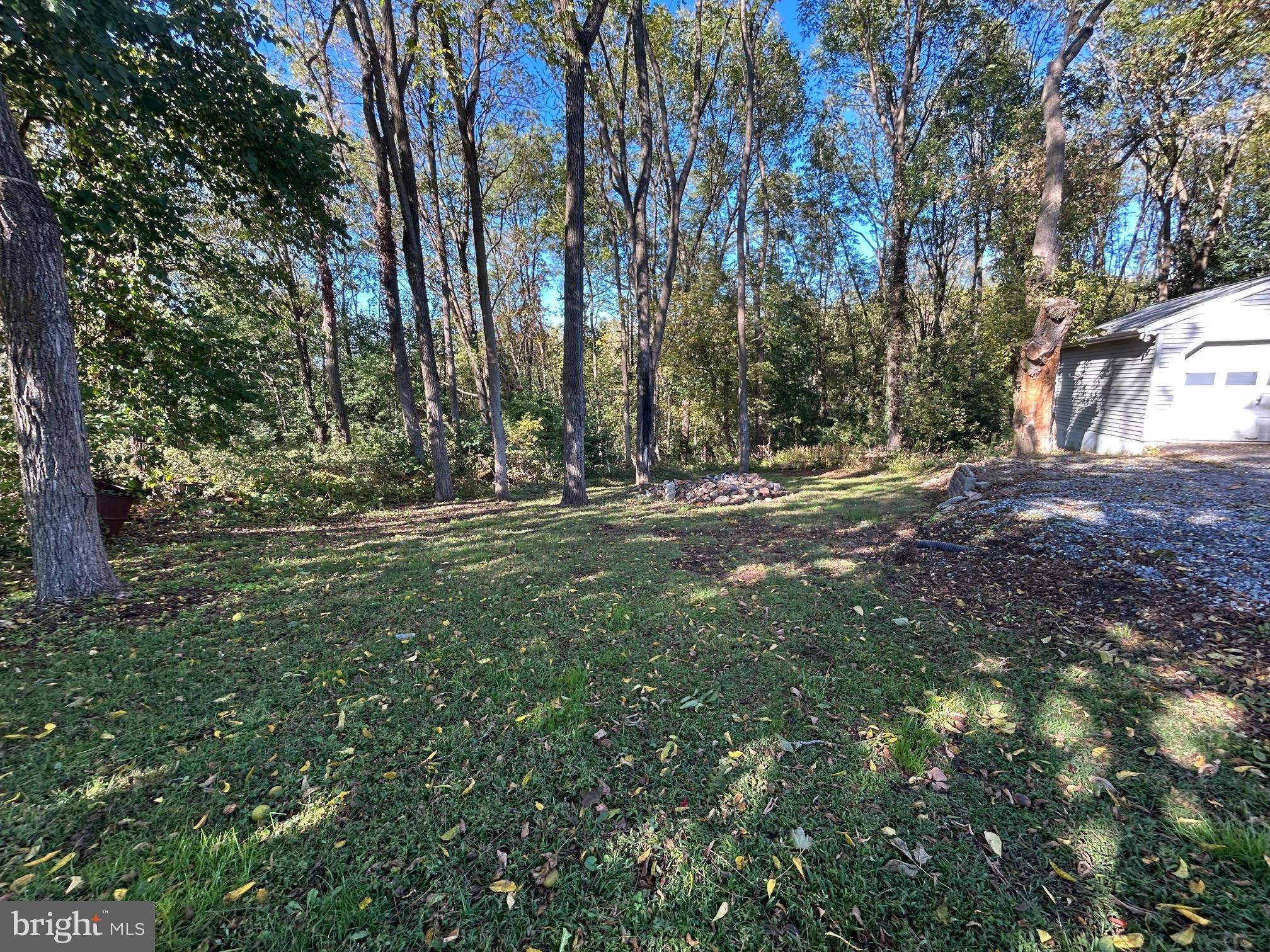 1355 Penn Grant Road, Unit 1 Strasburg, PA 17579 - Photo 14 of 14 a view of outdoor space with trees all around