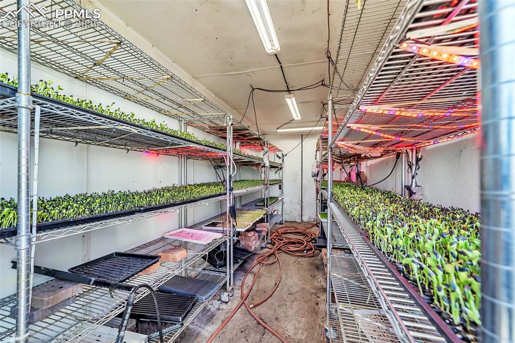 7545 North Log Road Peyton, CO 80831 - Photo 17 of 44 a view of a patio with table and chairs