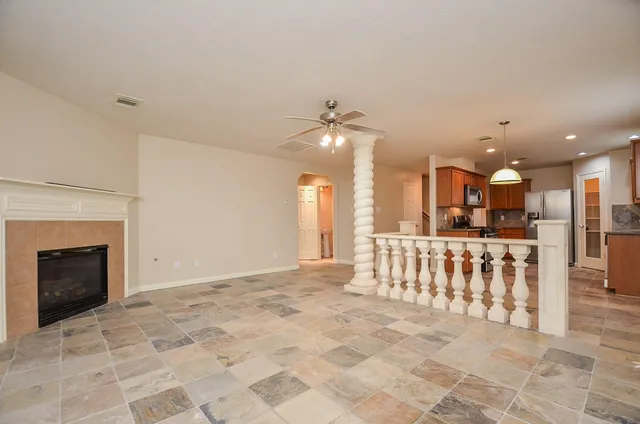 a view of a livingroom with furniture and a fireplace