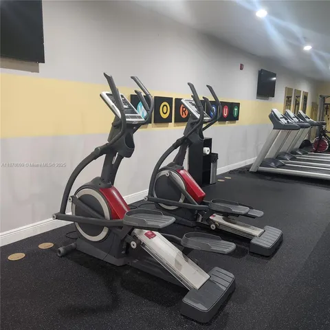 a view of a room with gym equipment