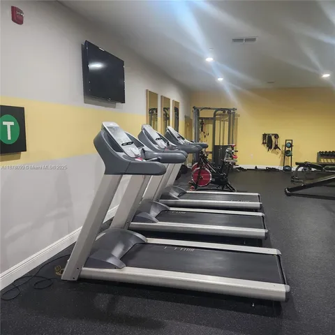 a view of a room with gym equipment