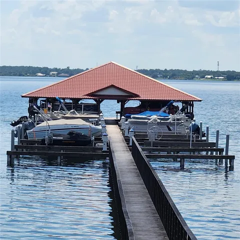 a view of a backyard with a deck