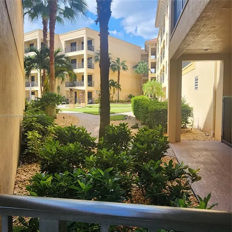 a aerial view of a house with a ocean view
