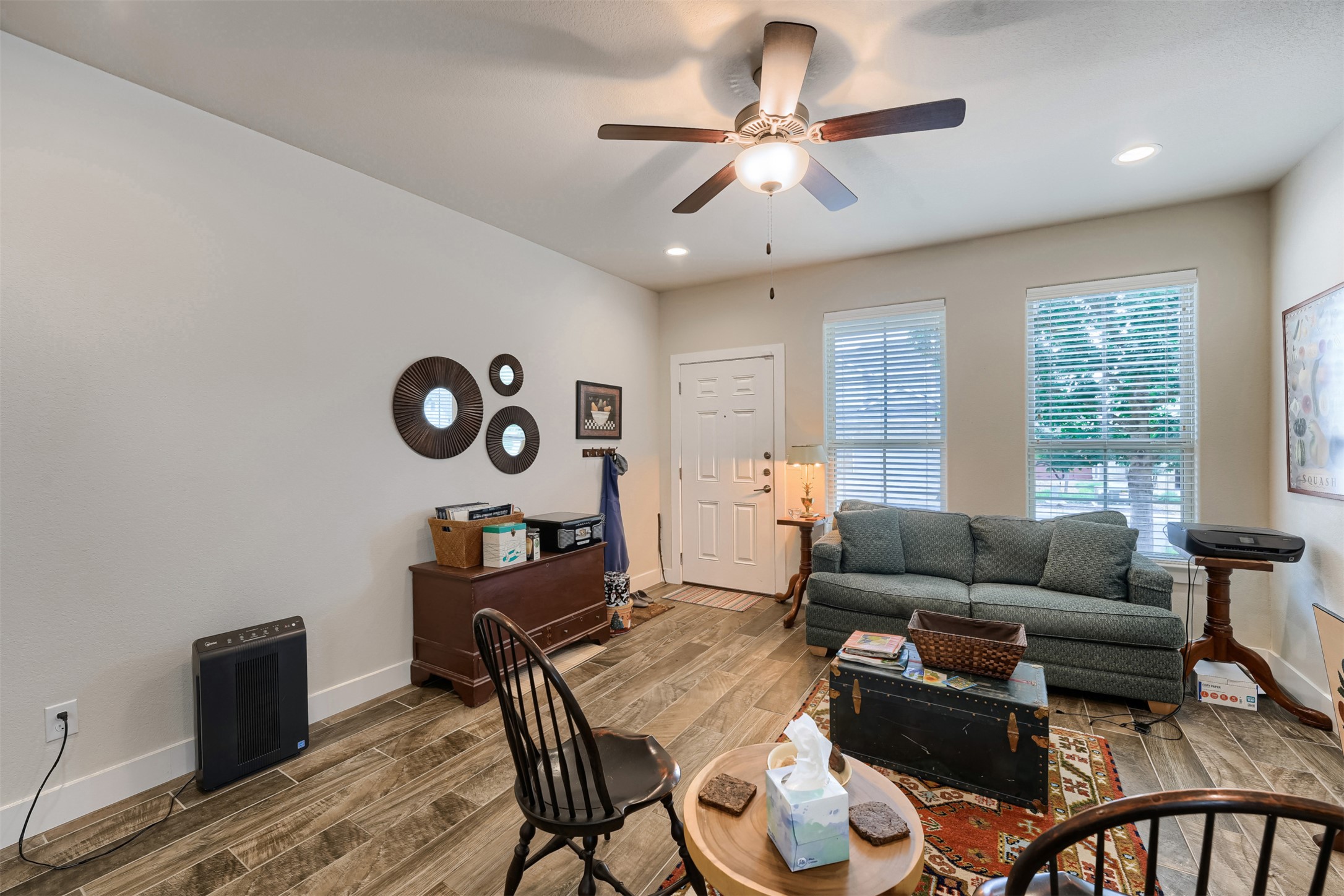 418 High Tech Drive Georgetown, TX 78626 - Photo 5 of 34 Living area featuring wood-finish flooring, recessed lighting, and a ceiling fan with integrated light fixture