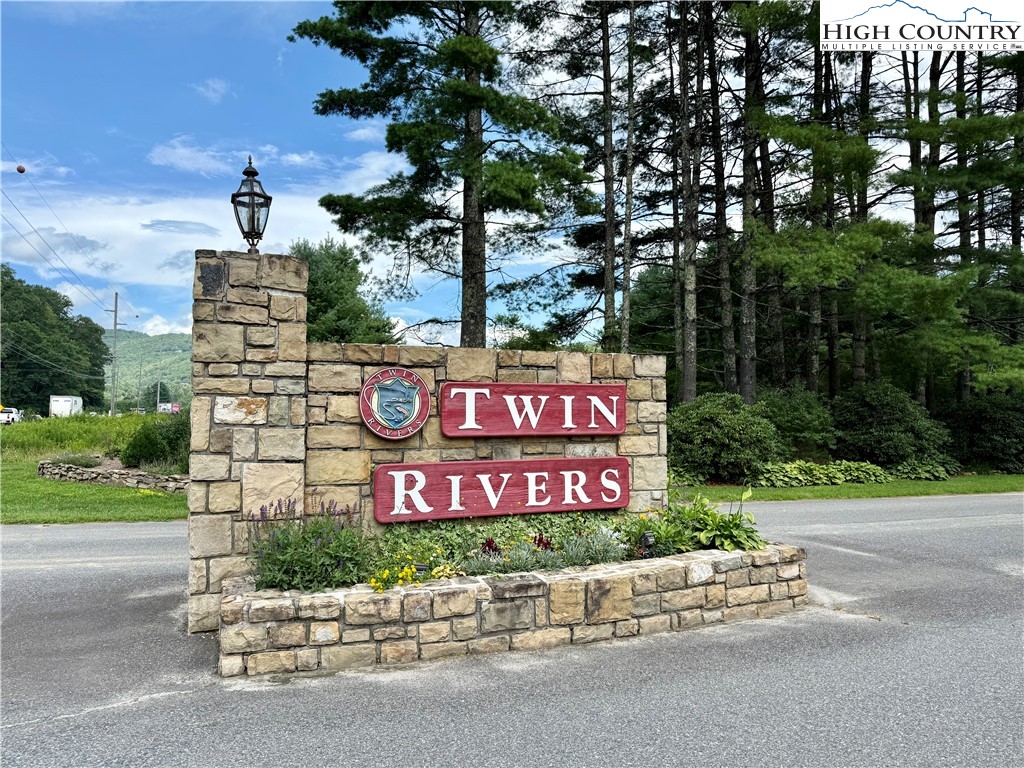 Lot 201 Twin Rivers Drive Boone, NC 28607 - Photo 11 of 14 a sign on the side of a road