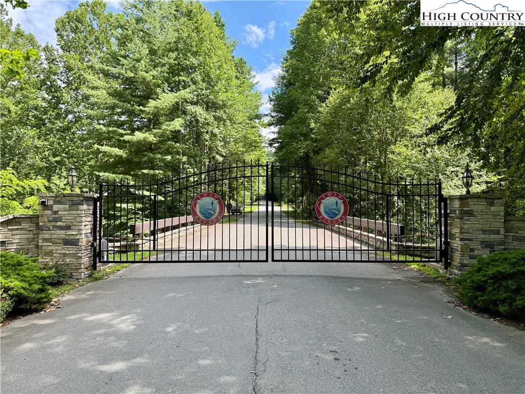 Lot 201 Twin Rivers Drive Boone, NC 28607 - Photo 12 of 14 a view of a street with a trees